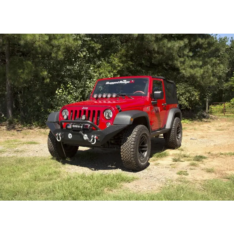 Red Jeep parked in grass - Rugged Ridge Spartan Front Bumper HCE w/Overrider 07-18 Jeep Wrangler JK