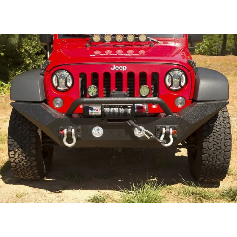 Close-up of red Jeep with black bumper - Rugged Ridge Spartan Front Bumper HCE w/Overrider for 07-18 Jeep Wrangler JK.