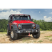 Rugged Ridge Spartan Grille on Jeep Wrangler JK parked on dirt road