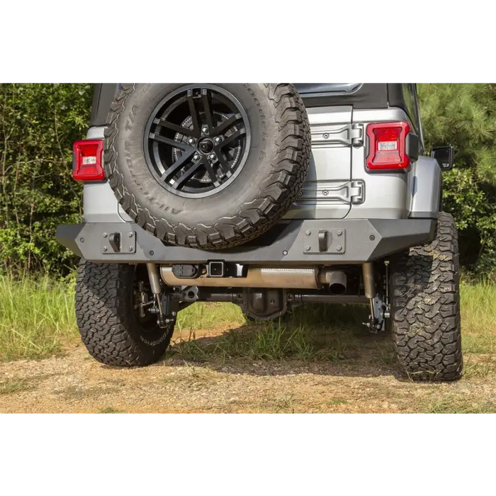 Rugged Ridge Spartan rear bumper on jeep Wrangler JL dirt road.
