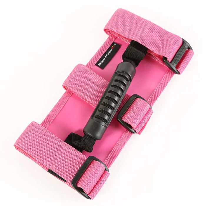 Pink camera strap attached to Rugged Ridge Ultimate Grab Handles for Jeep Wrangler