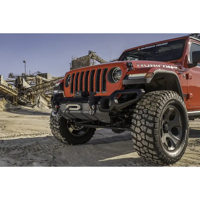 Red Jeep parked in dirt lot - Rugged Ridge Venator Front Bumper for Jeep Wrangler.
