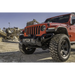 Red Jeep parked in dirt lot - Rugged Ridge Venator Front Bumper for Jeep Wrangler.