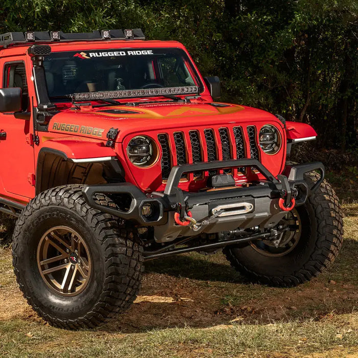 Rugged Ridge Venator Front Bumper with Winch Tray on Red Jeep in Field