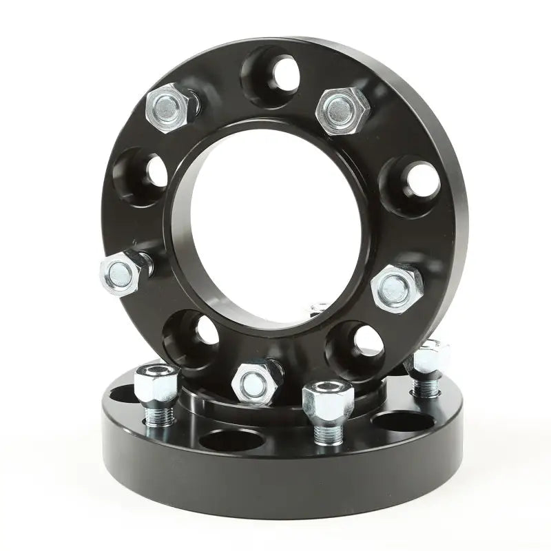 Black wheel spacer with bolts - Rugged Ridge Wheel Spacers 1.25-In 5x150mm Tundra