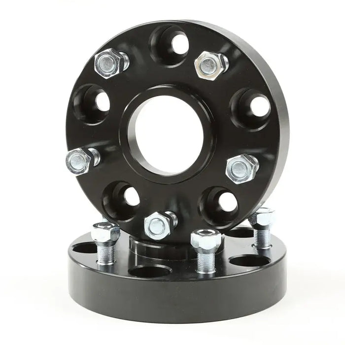 Rugged Ridge black wheel spacer with 4 bolts, 1.25 inch, for Jeep Wrangler JK.