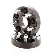 Rugged Ridge black wheel spacers on white background