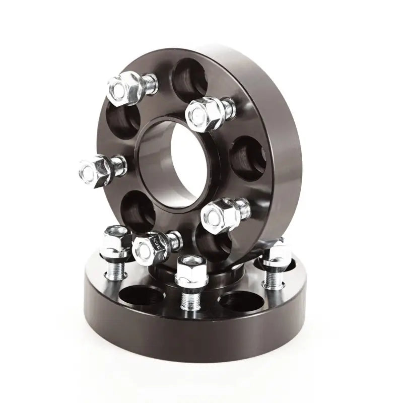 Rugged Ridge black wheel spacers on white background