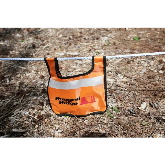 Rugged Ridge Winch Line Dampener bag hanging on a clothes line