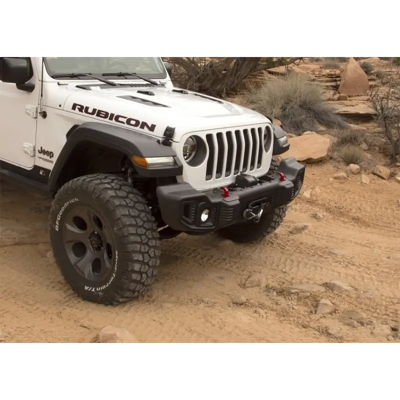 Rugged Ridge Winch Mount Plate for Jeep JL/JT parked on rocky desert road