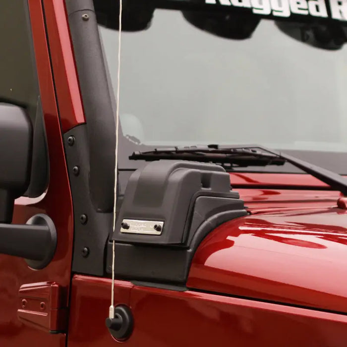 Side view of red Jeep Wrangler JK with Rugged Ridge XHD Low-Mount Snorkel.
