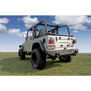 Jeep parked in grass near Rugged Ridge XHD Rear Bumper.