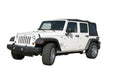 White jeep wrangler jk with black top and tires- skyjacker coil spring set