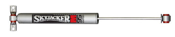 Skyjacker m95 performance shock absorber with silver exhaust muffle and red handle