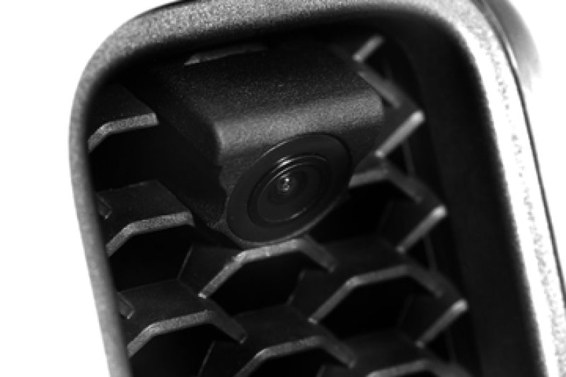 Black and white close-up of grille mounted front camera kit for jeep wrangler