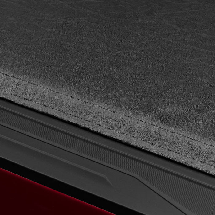 Tonno pro lo-roll tonneau cover for toyota tacoma - red car interior view