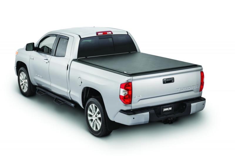 Tonno pro lo-roll tonneau cover on toyota tacoma truck with black bed cover