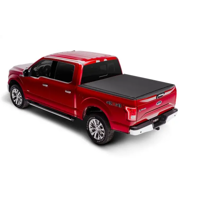 Red truck with Truxedo Pro X15 bed cover.