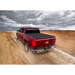 Red truck driving down dirt road - Truxedo Pro X15 Bed Cover for Toyota Tacoma