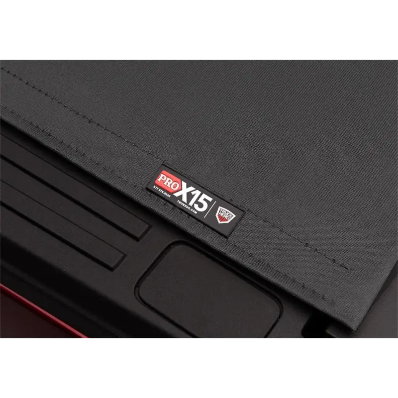 Compact size laptop displayed in Truxedo 16-20 Toyota Tacoma 5ft Pro X15 Bed Cover.