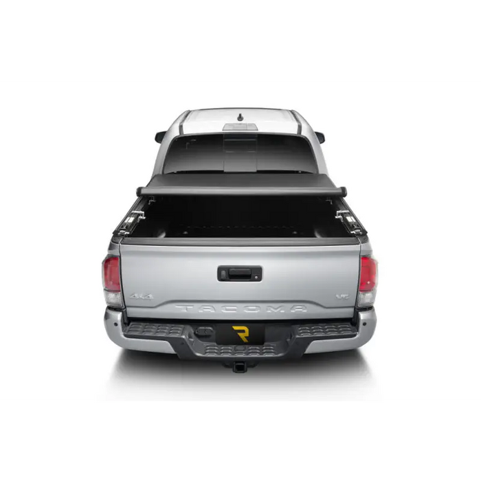Silver truck bed cover for Toyota Tacoma 5ft TruXport.