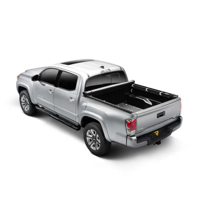 Truxedo Toyota Tacoma truck bed cover open and ready.