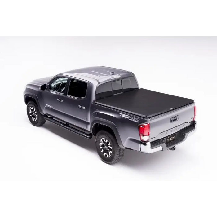 Truxedo 16-20 Toyota Tacoma 5ft TruXport Bed Cover on a truck with black bed cover