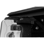 Black chair with seat belt displayed in Truxedo 2020 Jeep Gladiator 5ft Lo Pro Bed Cover.