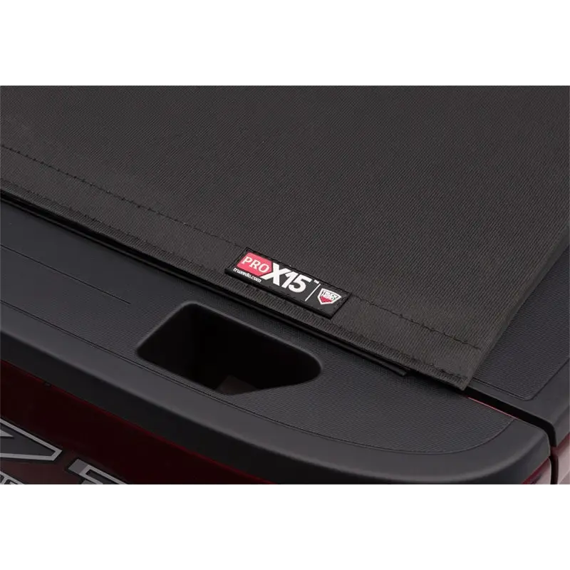 Truxedo 2020 Jeep Gladiator 5ft Pro X15 Bed Cover rear bumper logo view.