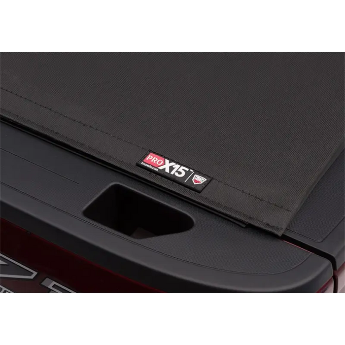 Truxedo 2020 Jeep Gladiator 5ft Pro X15 Bed Cover rear bumper logo view.