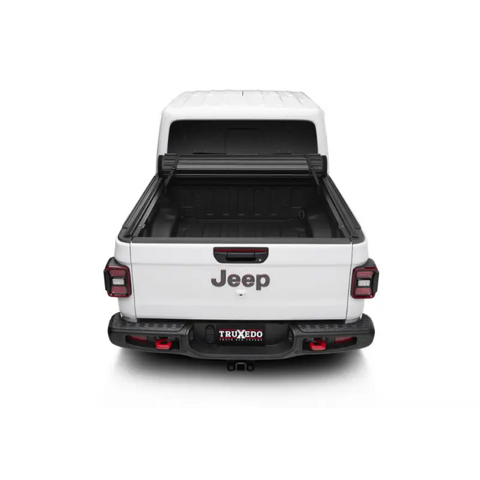 Rear view of 2019 GMC truck with Truxedo Sentry CT bed cover for Jeep Gladiator