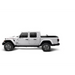 White Jeep Gladiator with black bumper featuring Truxedo Sentry CT Bed Cover.