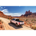 Truxedo 2020 Jeep Gladiator 5ft Sentry CT Bed Cover driving down desert road