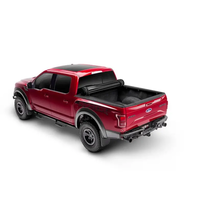 Truxedo 2020 Jeep Gladiator 5ft Sentry CT bed cover with a red truck and black cover