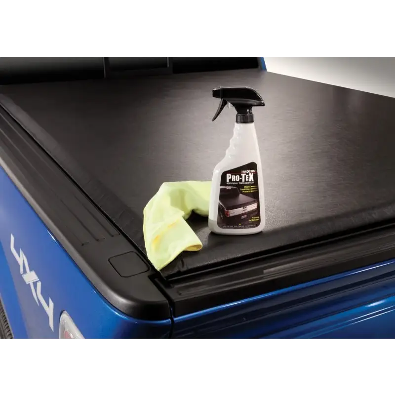 Truxedo Pro-TeX Protectant Spray - 20oz for Jeep Wrangler - Blue Car with Spray Bottle and Yellow Cloth