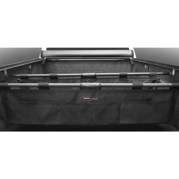 Truxedo Truck Luggage Bed Organizer/Cargo Sling for Chevrolet Silverado, Dodge D100, D200 - black plastic bag with handle.