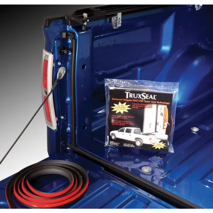 Truxedo TruXseal Universal Tailgate Seal - Blue truck with red hose attached
