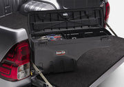 Undercover 05-20 toyota tacoma drivers side swing case - black smooth: truck bed storage box open and ready for installation