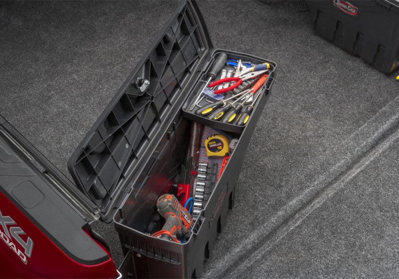 Undercover 05-20 toyota tacoma truck bed driver side swing case in black - tool box is open and ready