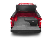 Undercover 05-20 toyota tacoma passenger side swing case - black smooth: red truck with open trunk compartment