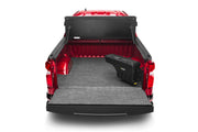 Undercover 05-20 toyota tacoma passenger side swing case - black smooth: red truck with bed folded open