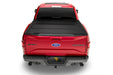 Red 2019 ford f-150 truck rear view - undercover armor flex bed cover