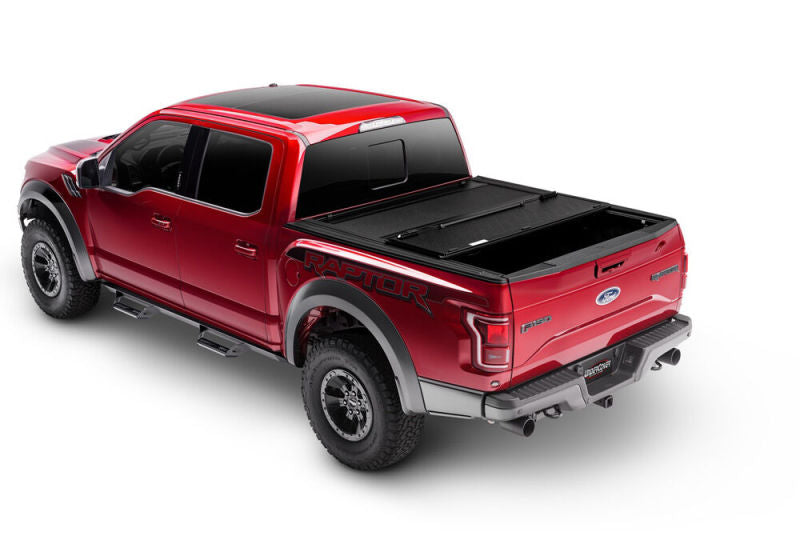 Red truck with black bed cover - undercover armor flex for toyota tacoma 5ft, offroad accessory