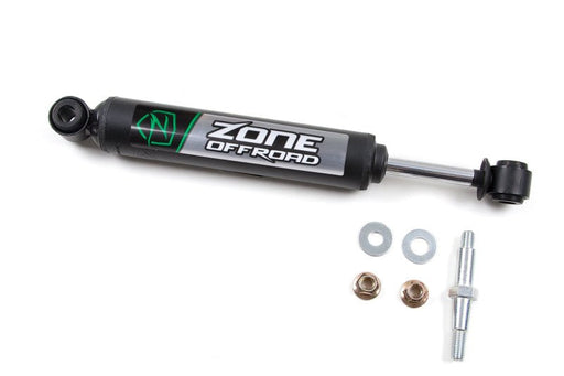Close up of black cylinder with screw and nuts on zone offroad jeep wrangler yj/tj single steering stabilizer - black