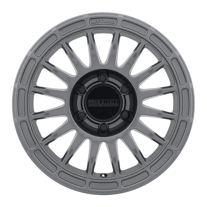 Method mr314 17x8 gloss titanium wheel with black and gray spokes.
