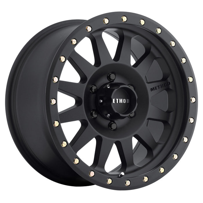 Method mr304 double standard black wheel with gold studs.