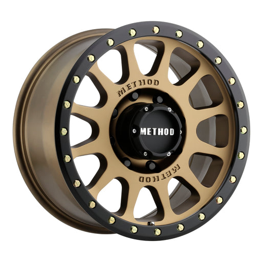 Method mr305 nv 20x10 wheel with black and gold rim