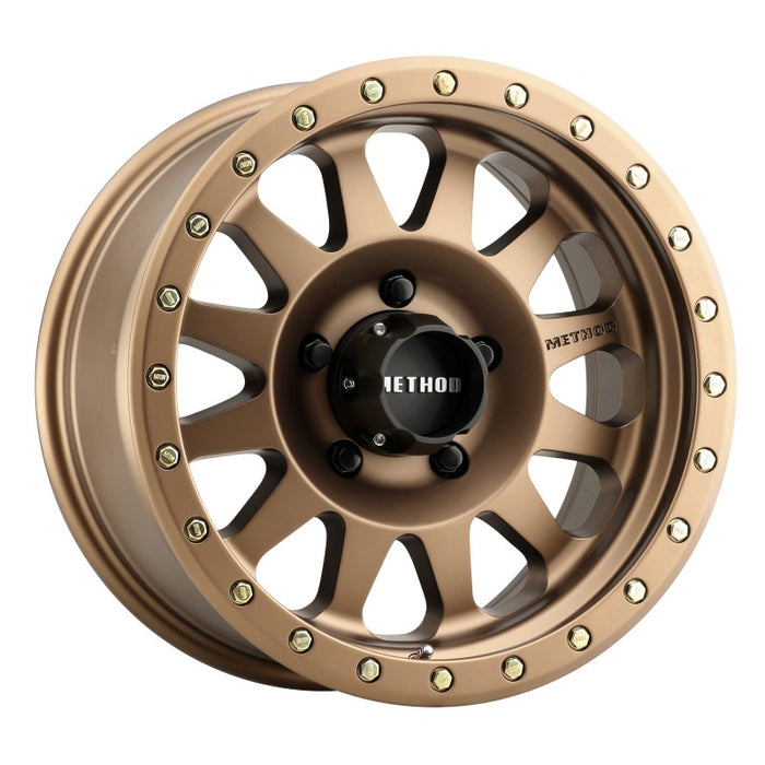 Method mr304 double standard 17x8.5 wheel in bronze with black and gold center