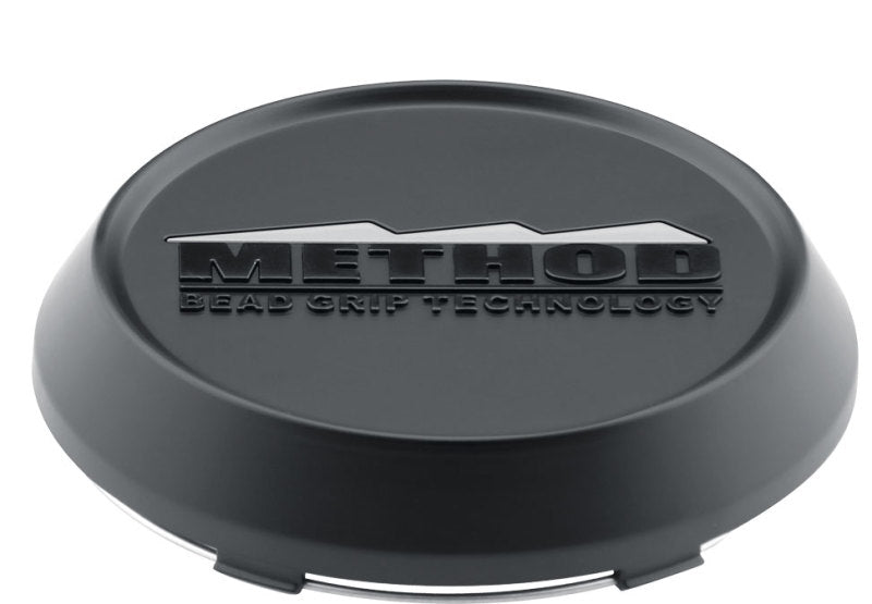 Method cap t080 - 123mm - black - snap in, black metal cap with word ’meto’