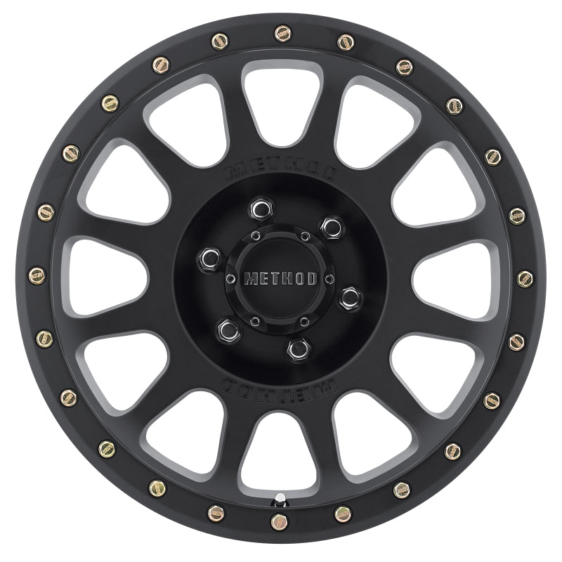 Method mr305 nv 17x8.5 0mm offset 6x135 matte black wheel with gold spokes
